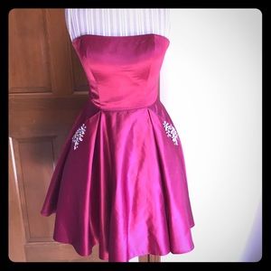 Cranberry satin prom dress with pockets size M